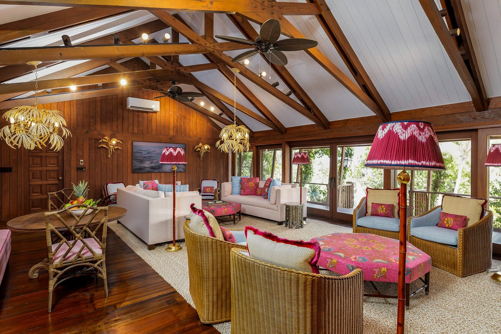 The main living room at Flight Central, with vaulted timber ceiling and chandeliers
