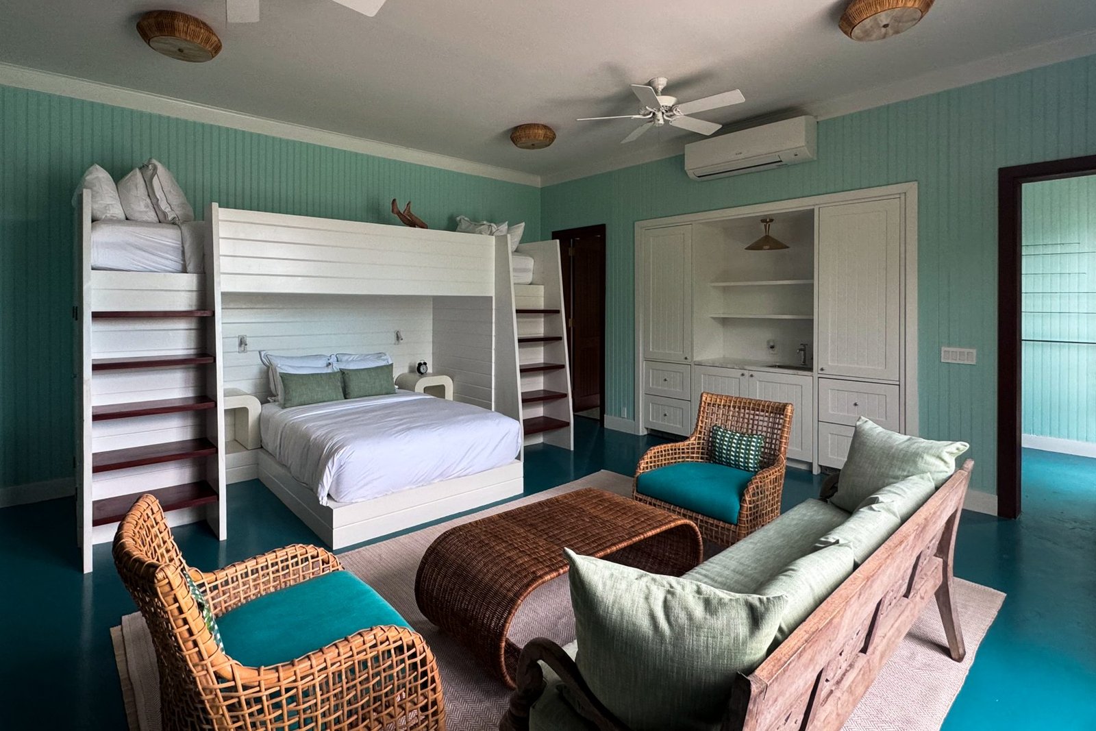 The bunk room, with a double bed and two singles above