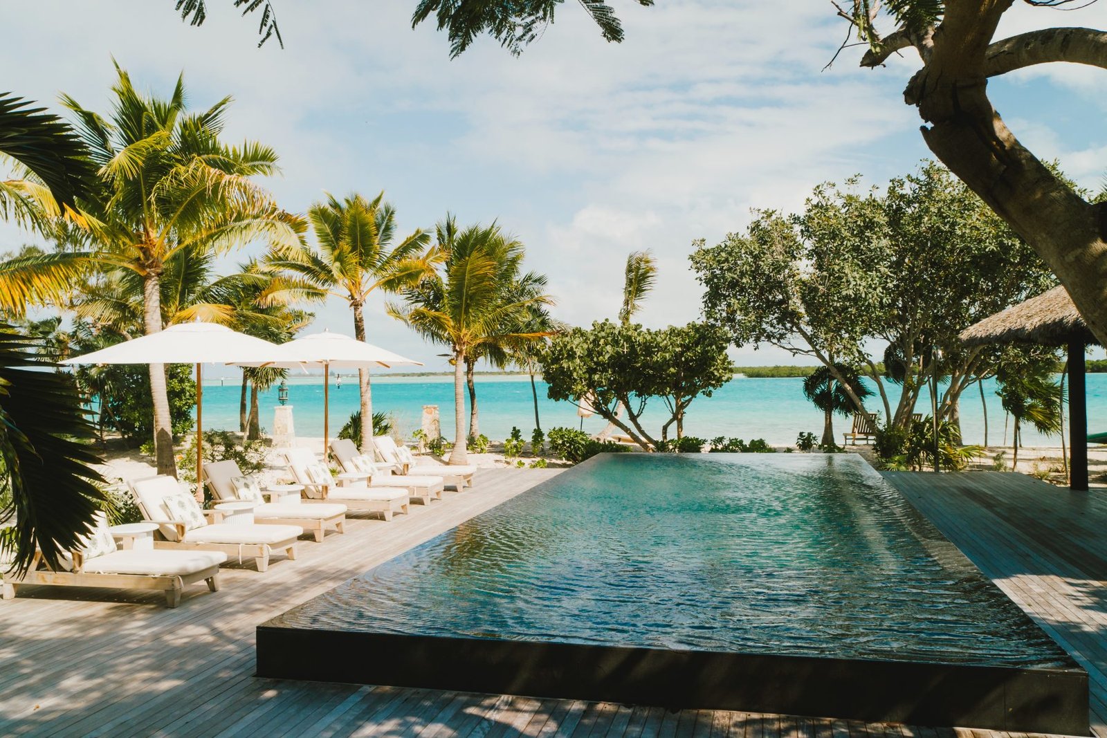 The infinity pool and deck at Flight Central, looking out over the Leeward channel