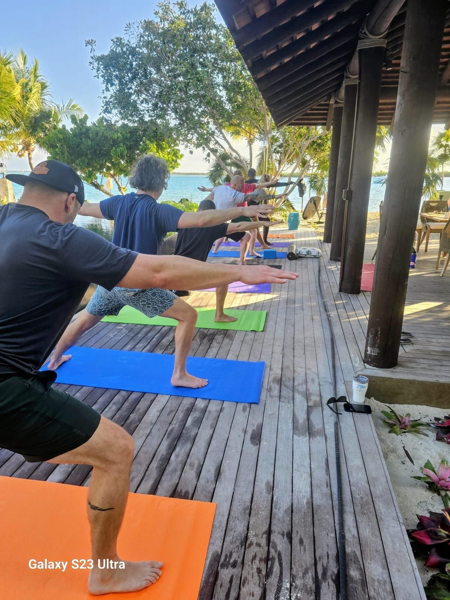 Morning yoga on the deck before the first ride